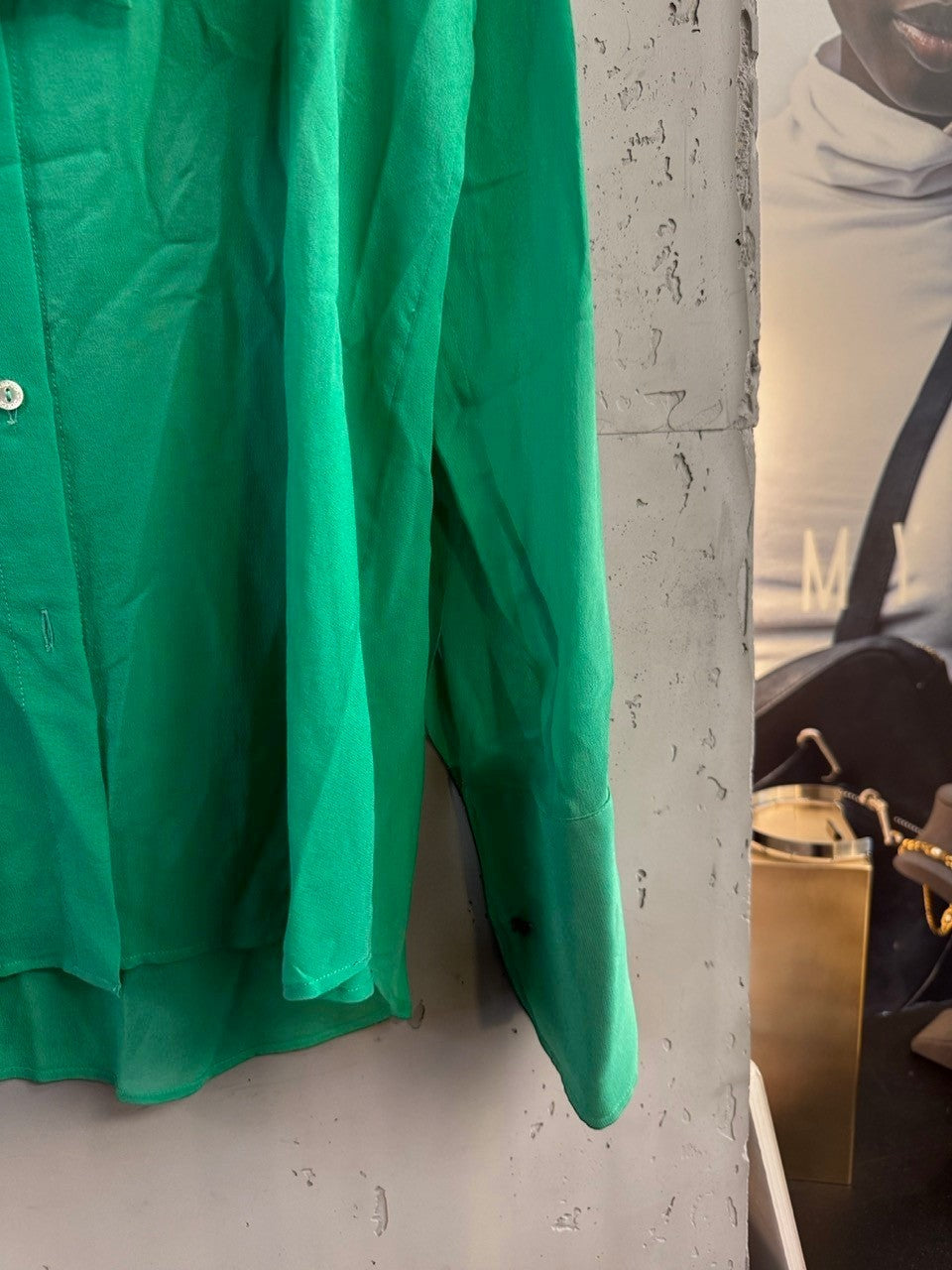 BERLIN VINTAGE CORNER emerald green Dolce & Gabbana silk pussy bow blouse with long sleeves and buttoned cuffs.