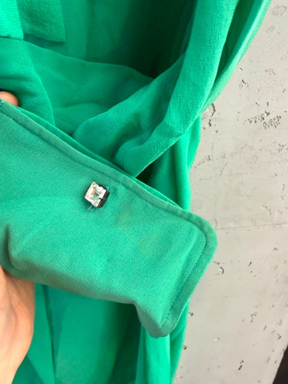 BERLIN VINTAGE CORNER emerald green Dolce & Gabbana silk pussy bow blouse with crystal button cuff detail.
