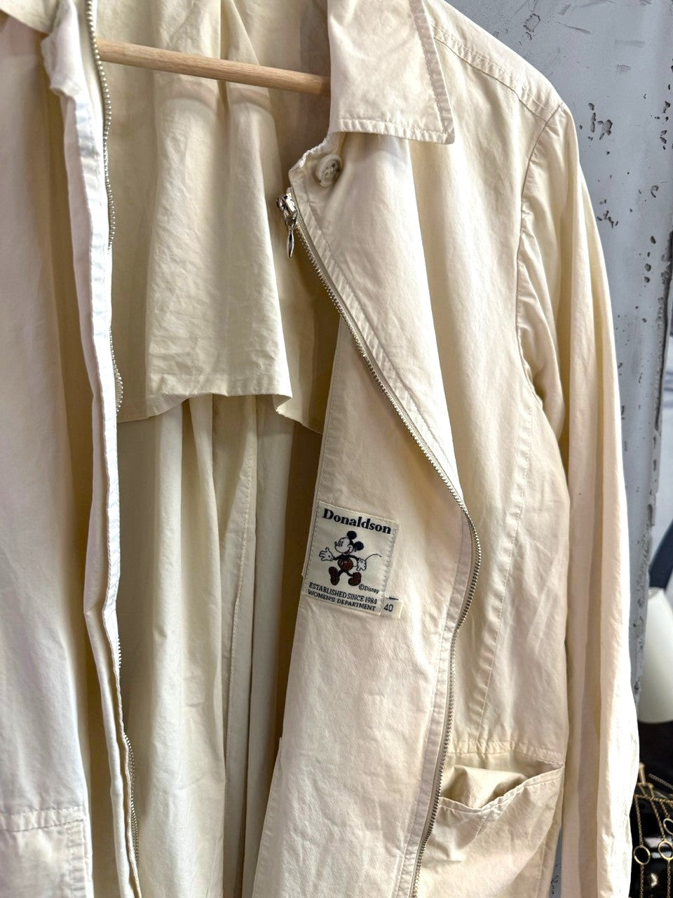BERLIN VINTAGE CORNER off-white Donaldson lightweight trench coat with Mickey Mouse interior label and zip closure
