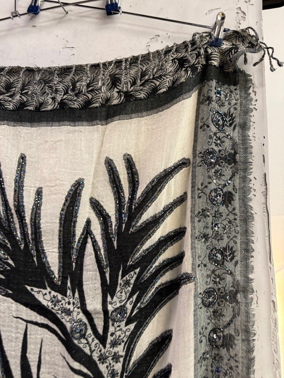 BERLIN VINTAGE CORNER cream and black botanical scarf with shimmering beaded border and frayed edges.