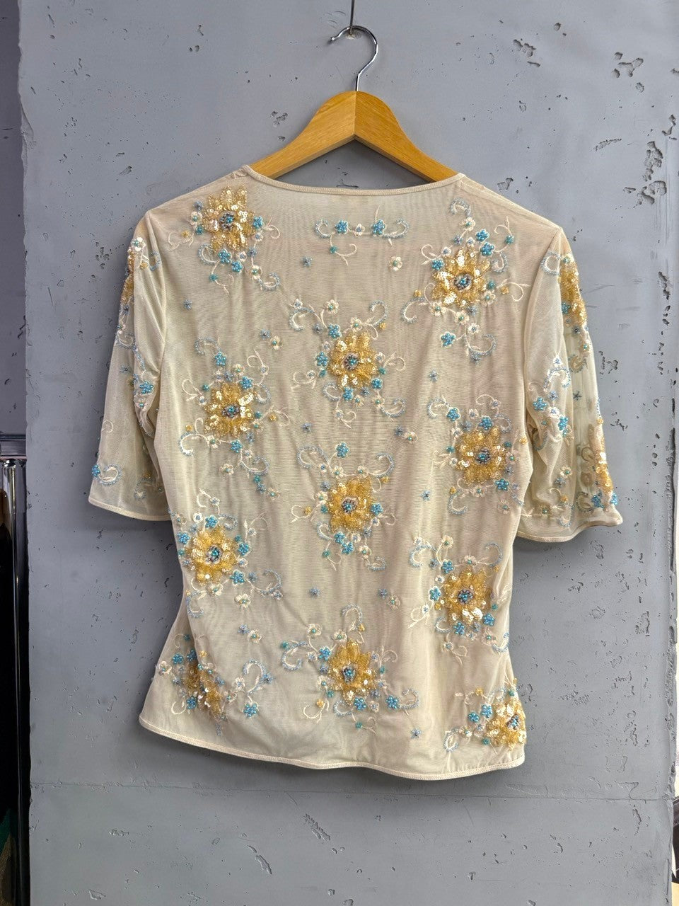 BERLIN VINTAGE CORNER sheer mesh blouse with short sleeves, embellished with gold and turquoise floral embroidery and beads.