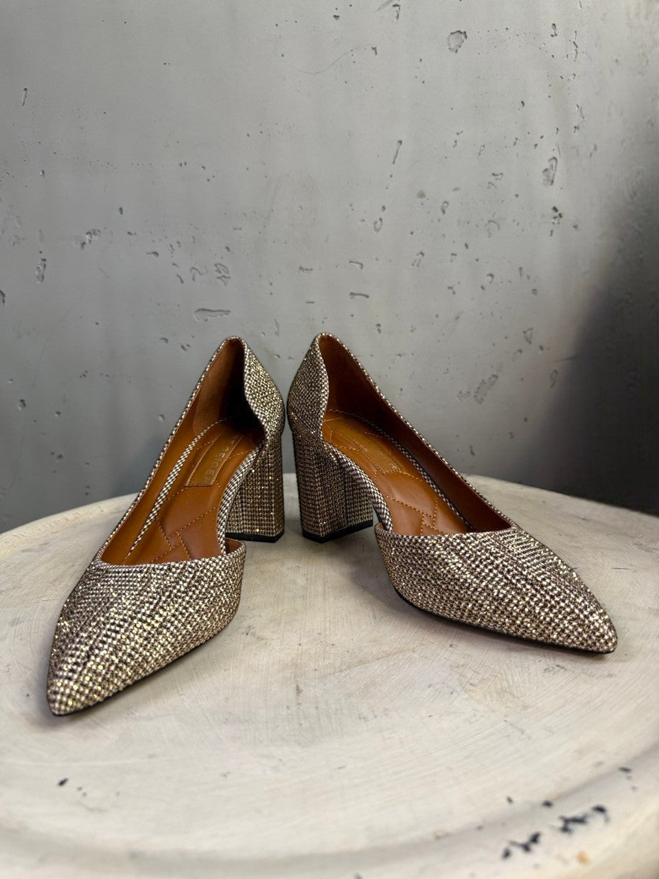 BERLIN VINTAGE CORNER embellished pointed toe block heels in shimmering gold fabric with sparkling details.