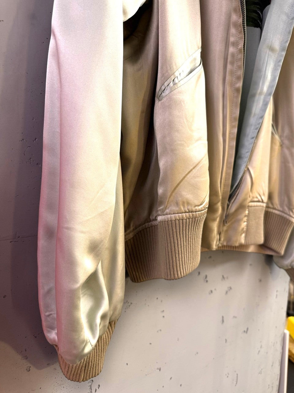 BERLIN VINTAGE CORNER champagne satin bomber jacket with traditional Japanese embroidery and ribbed cuffs.