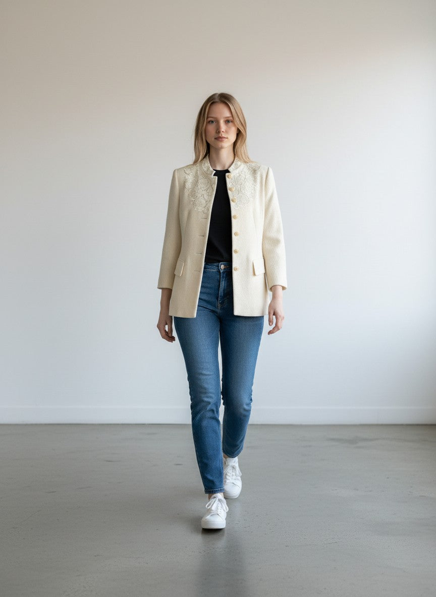 BERLIN VINTAGE CORNER cream wool silk blend jacket and skirt set with tonal embroidery and button closure.