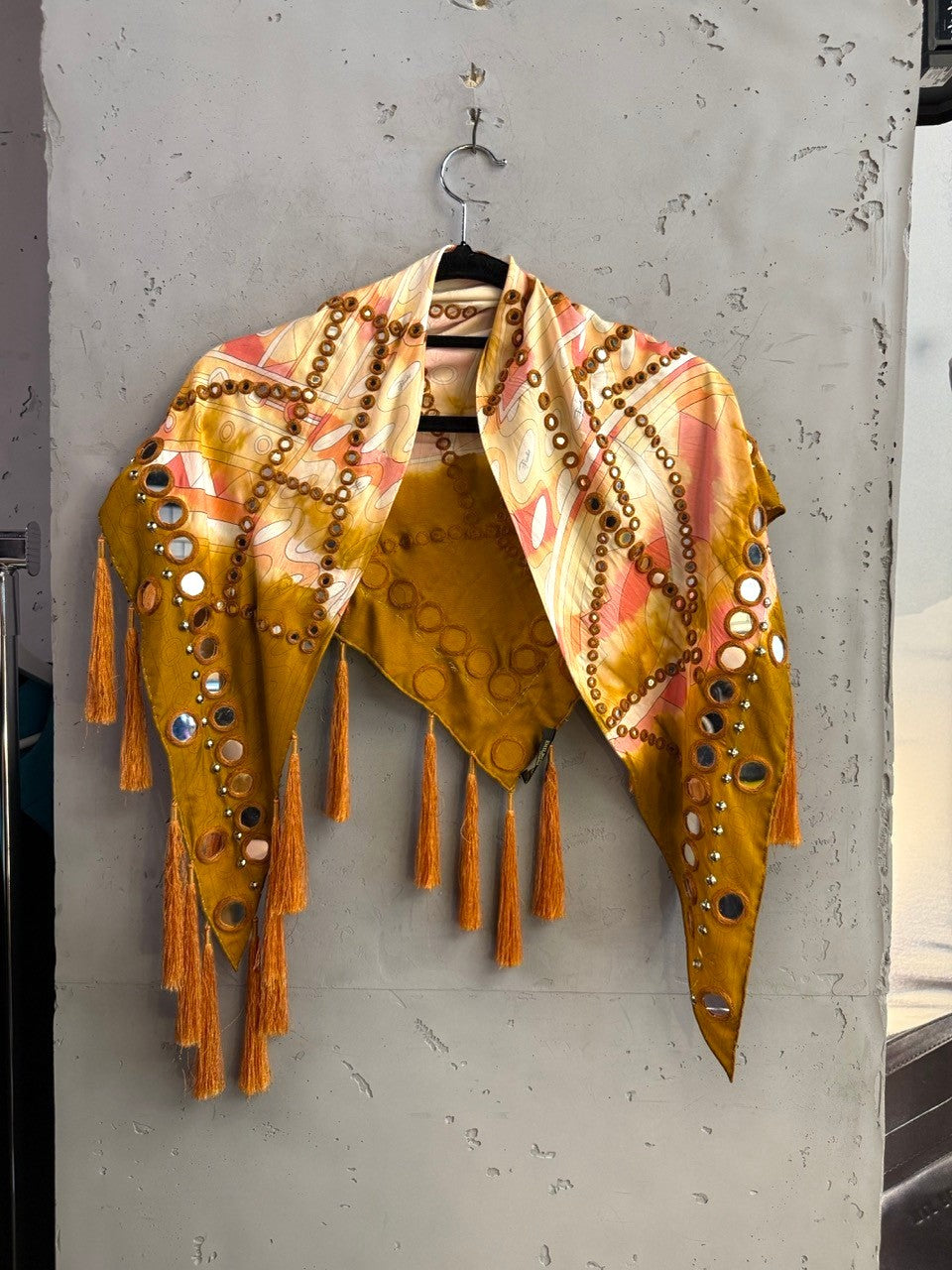 BERLIN VINTAGE CORNER Emilio Pucci mustard scarf with abstract print, mirror embellishments, and hanging tassels.