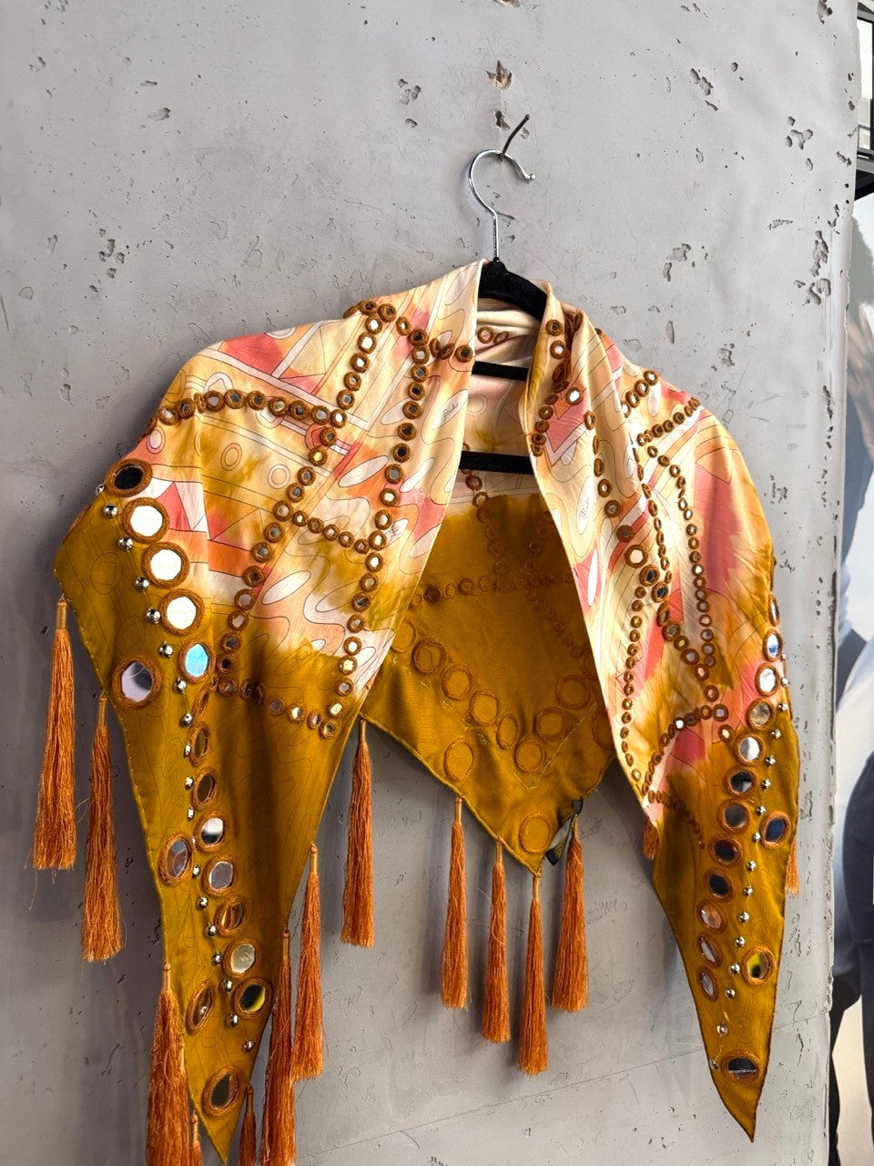 BERLIN VINTAGE CORNER Emilio Pucci mustard scarf with abstract print, mirror embellishments, and hanging tassels.
