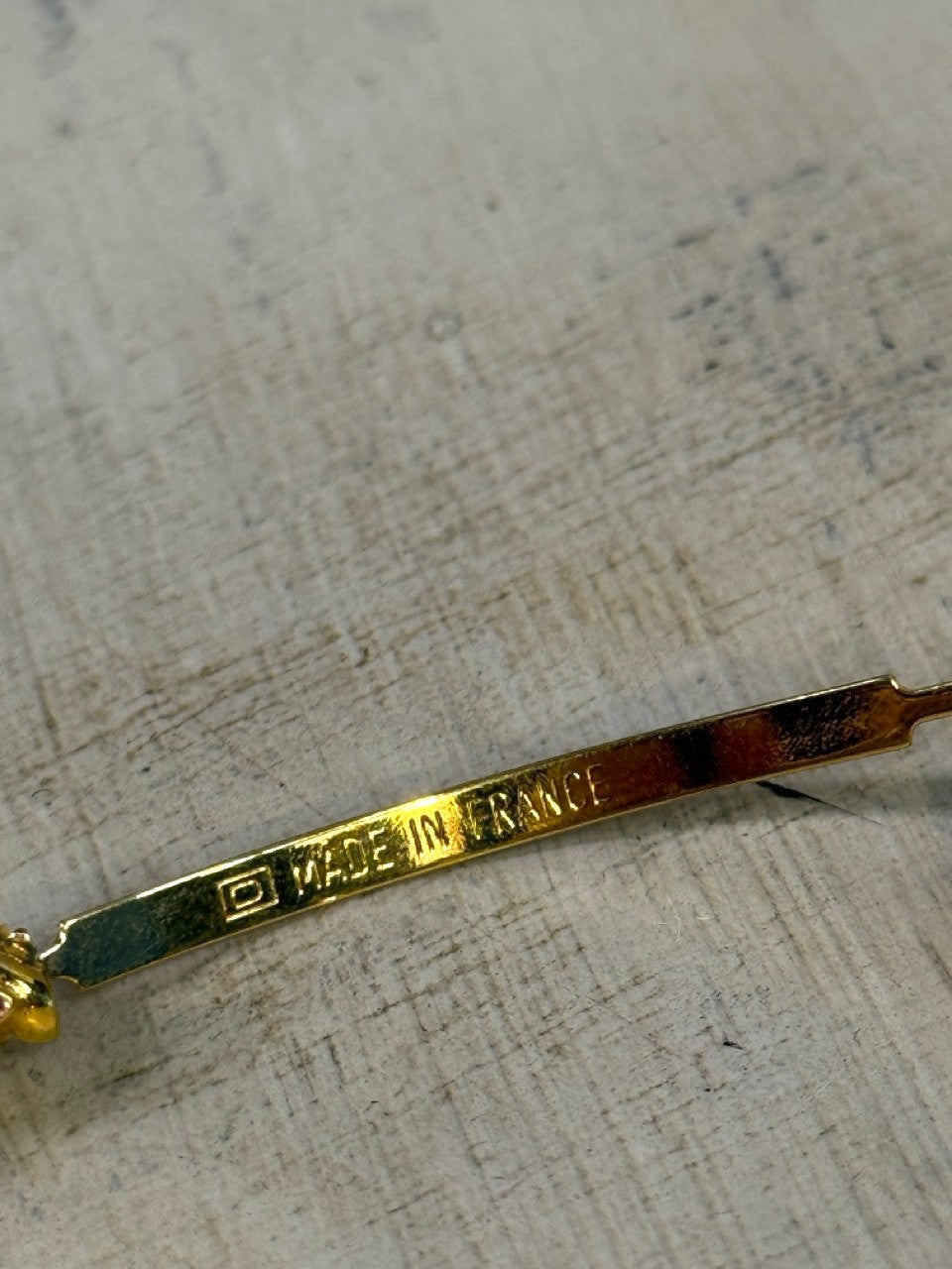 BERLIN VINTAGE CORNER gold-tone enamel barrette with "MADE IN FRANCE" engraving.
