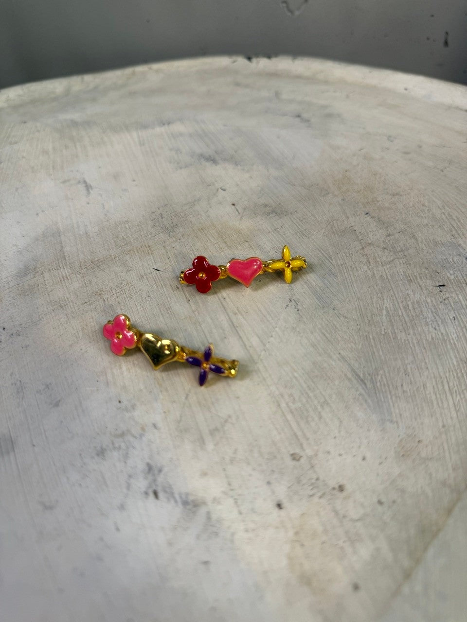 BERLIN VINTAGE CORNER gold-tone enamel hair clips with red flower, pink heart, and yellow flower charms.