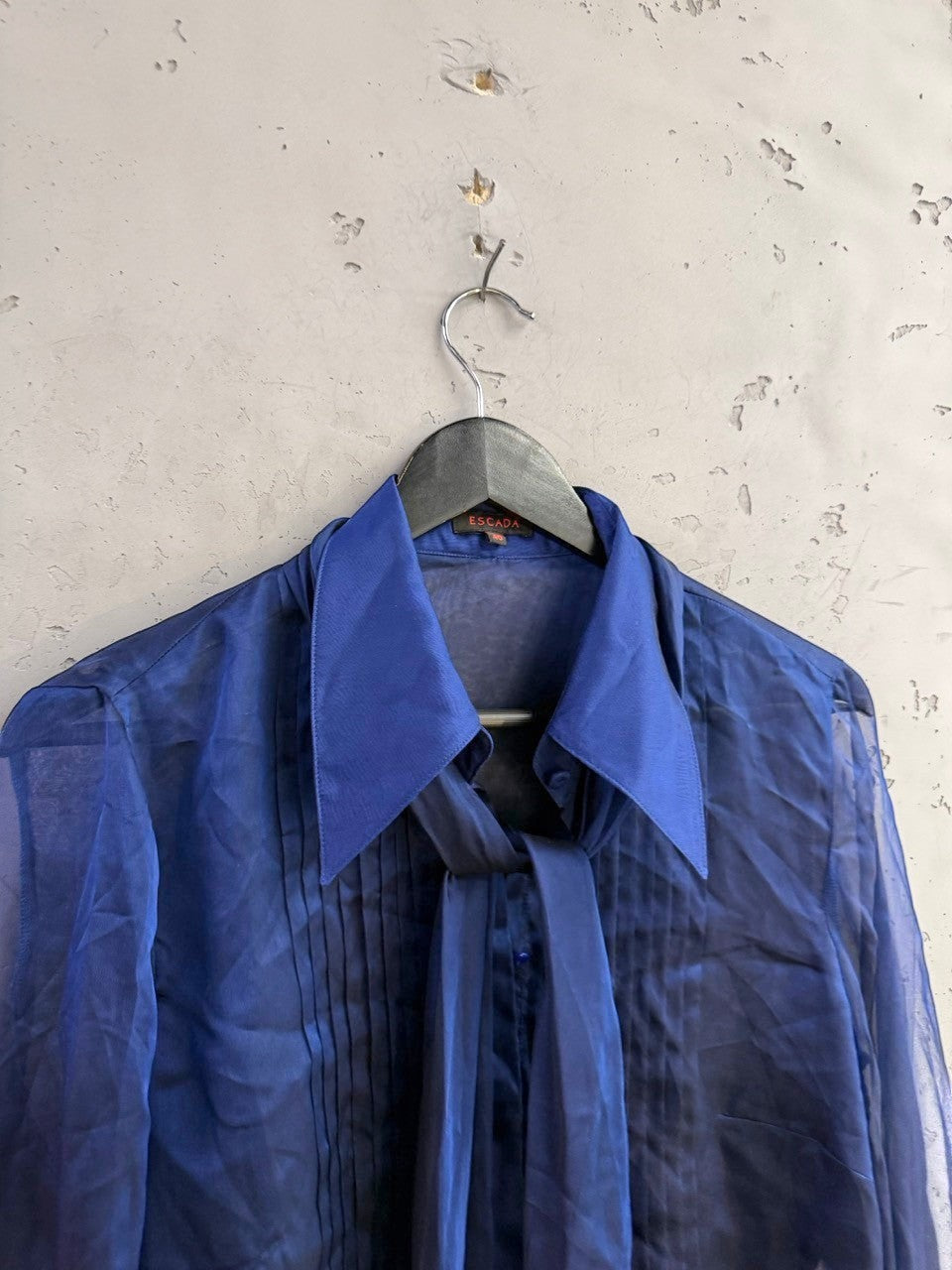 BERLIN VINTAGE CORNER Escada royal blue sheer long sleeve blouse with tie-neck detail and front pintuck pleating.