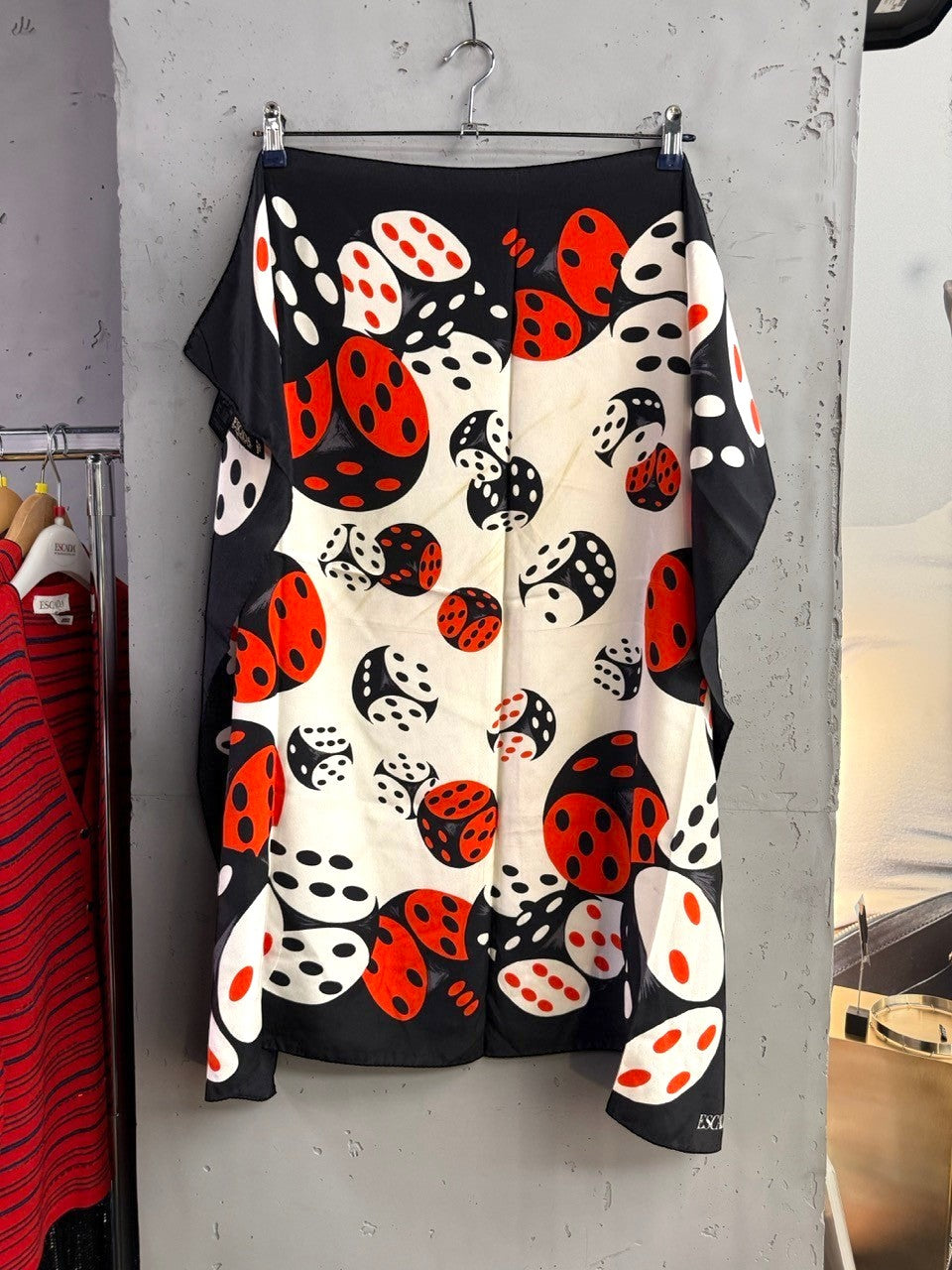 BERLIN VINTAGE CORNER vintage ESCADA silk scarf featuring a black, white, and red dice print on a square fabric.