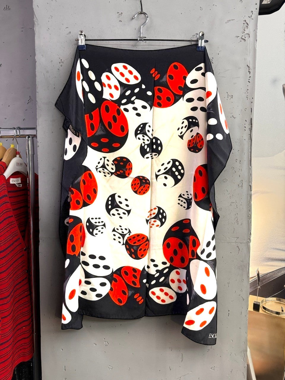 BERLIN VINTAGE CORNER vintage ESCADA silk scarf featuring a black, white, and red dice print on a square fabric.