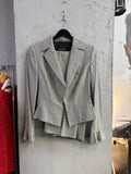 BERLIN VINTAGE CORNER ESCADA black and white houndstooth tailored two-piece suit with flared cuffs and single button.