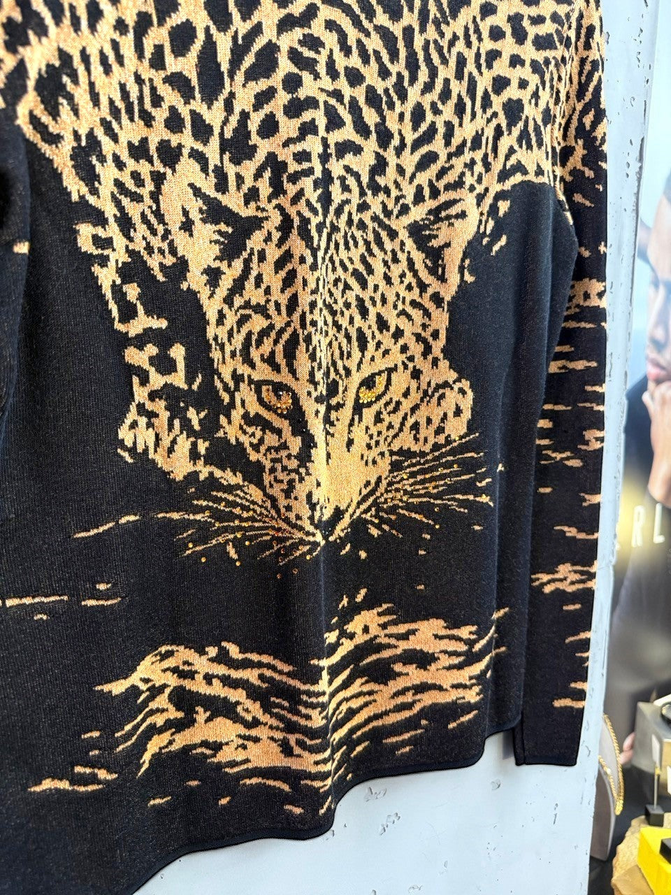 BERLIN VINTAGE CORNER ESCADA knit cardigan featuring a black and gold leopard face design with subtle embellishments.
