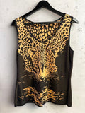 BERLIN VINTAGE CORNER Escada sleeveless knit top with a black and gold leopard print design and V-neckline.