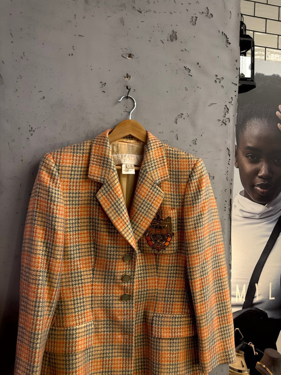 BERLIN VINTAGE CORNER Escada Margaretha Ley vintage orange and grey plaid wool-blend blazer with ornate crest patch.