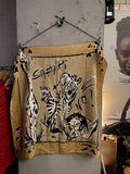 BERLIN VINTAGE CORNER ESCADA silk scarf in tan with black safari animal illustrations and artistic typography.