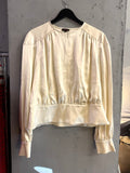 BERLIN VINTAGE CORNER cream Escada silk blouse with gathered shoulders, long sleeves, and front zip closure.