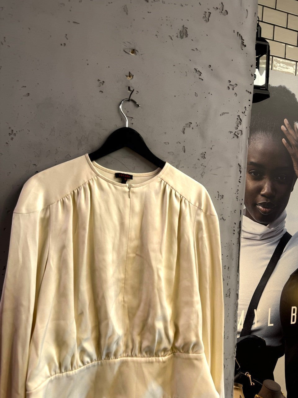 BERLIN VINTAGE CORNER cream Escada long sleeve silk blouse with gathered shoulders and front zipper closure.