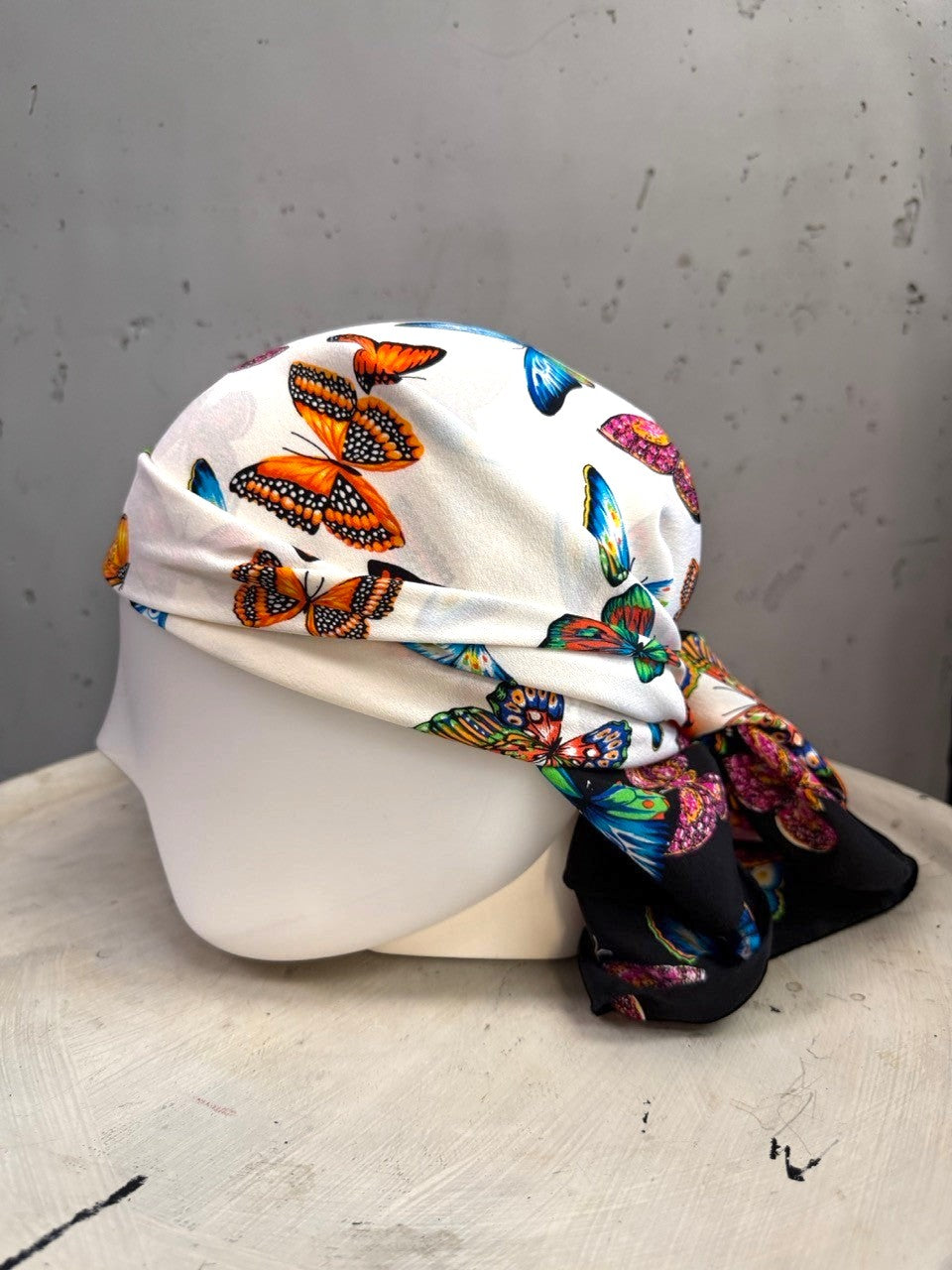 BERLIN VINTAGE CORNER Escada silk square scarf featuring a vibrant butterfly print on a white background