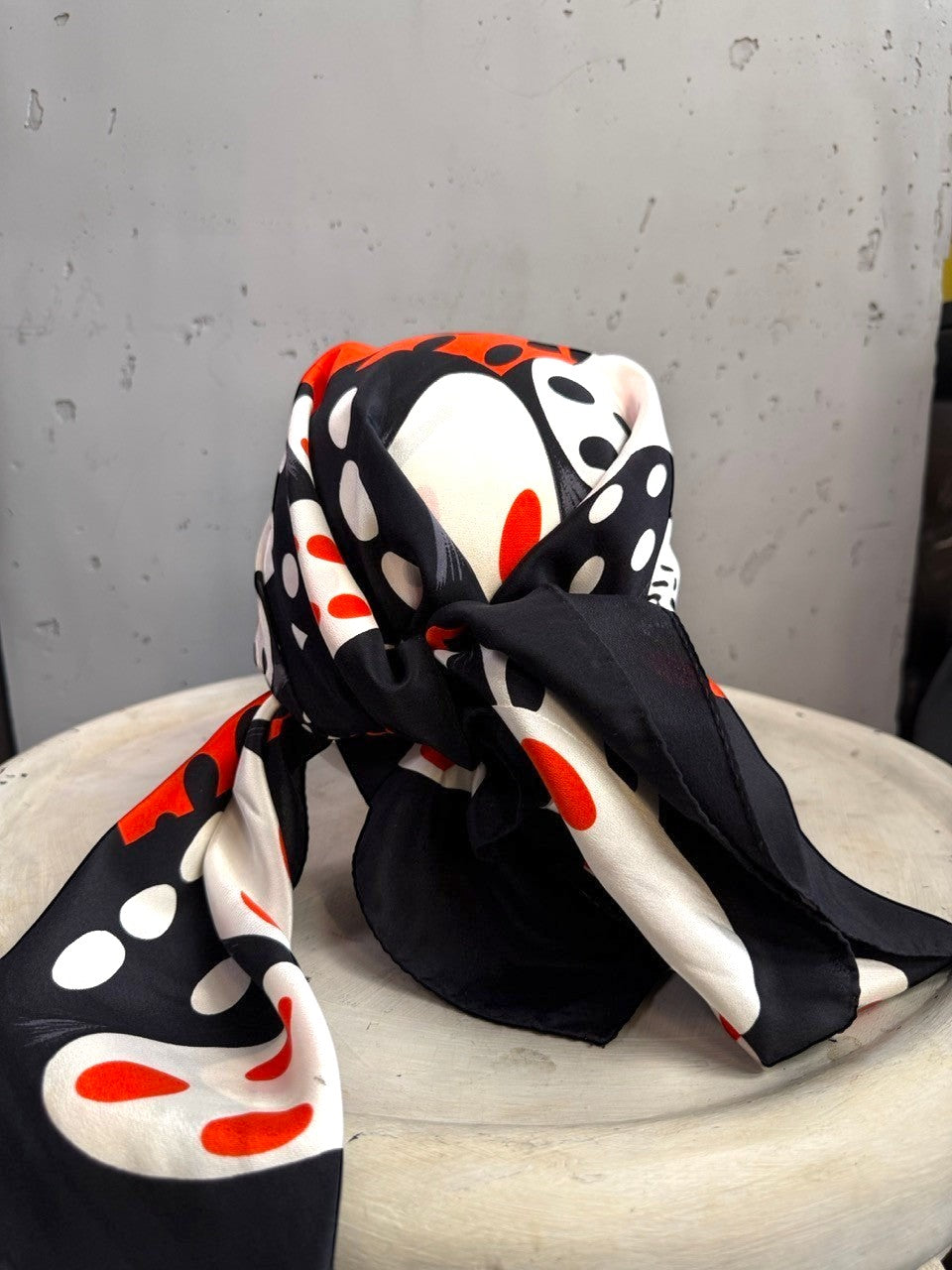 BERLIN VINTAGE CORNER vintage ESCADA silk scarf with a bold black, white, and red dice print pattern.