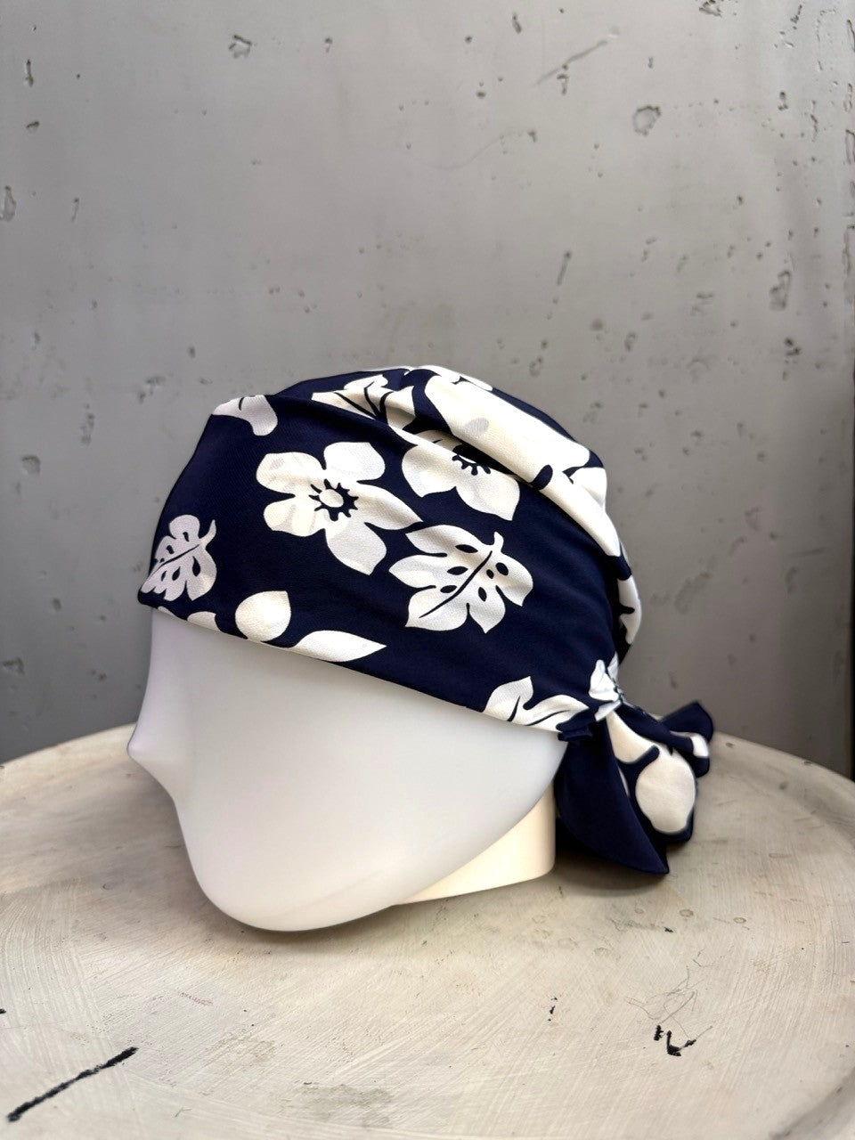 BERLIN VINTAGE CORNER Escada navy blue and white silk scarf with floral dolphin print styled as a headscarf