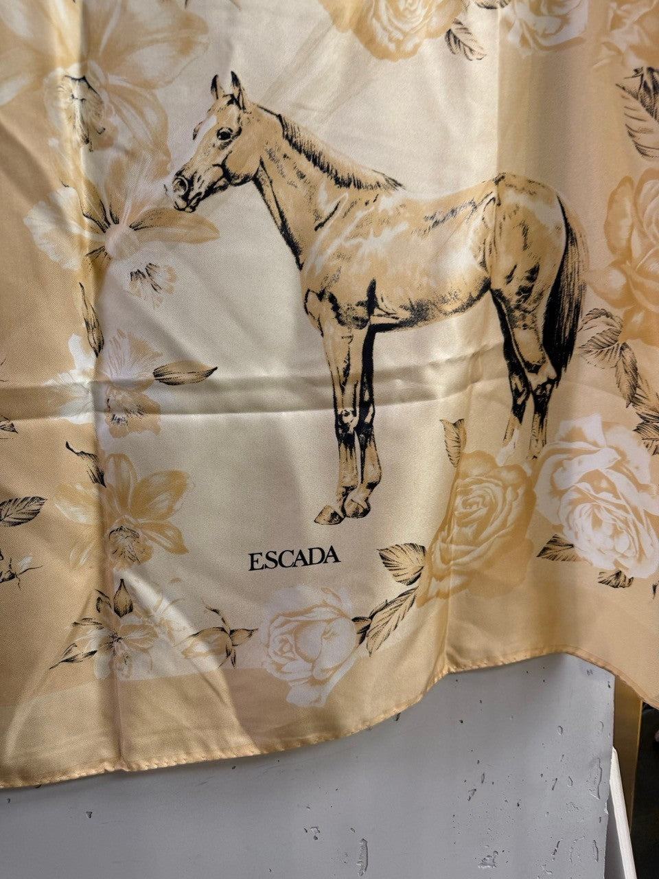 BERLIN VINTAGE CORNER Escada silk scarf in golden beige with horse and rose floral print in an equestrian-chic style.