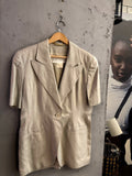 BERLIN VINTAGE CORNER Escada Margaretha Ley light beige silk-linen short sleeve blazer with single-button closure.