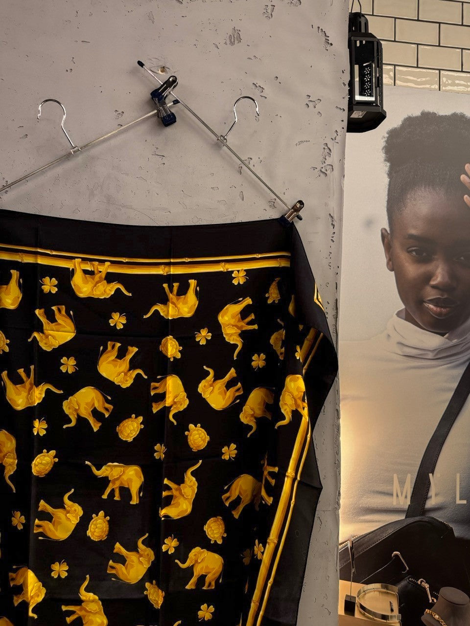 BERLIN VINTAGE CORNER ESCADA silk scarf in black with golden elephant, turtle, and clover print and bamboo border.