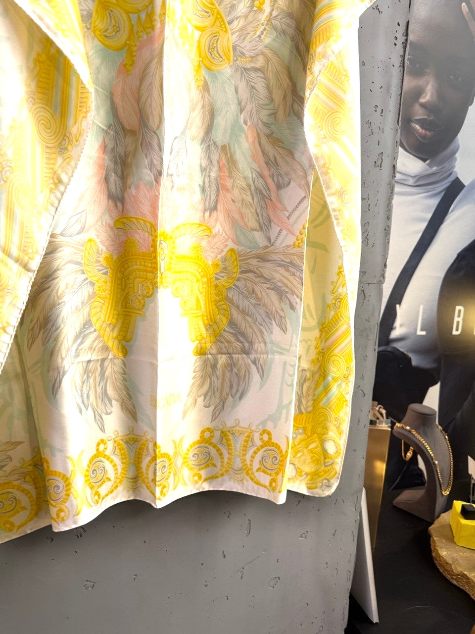 BERLIN VINTAGE CORNER Escada silk scarf with yellow, peach, and sage baroque feather print on a cream background.