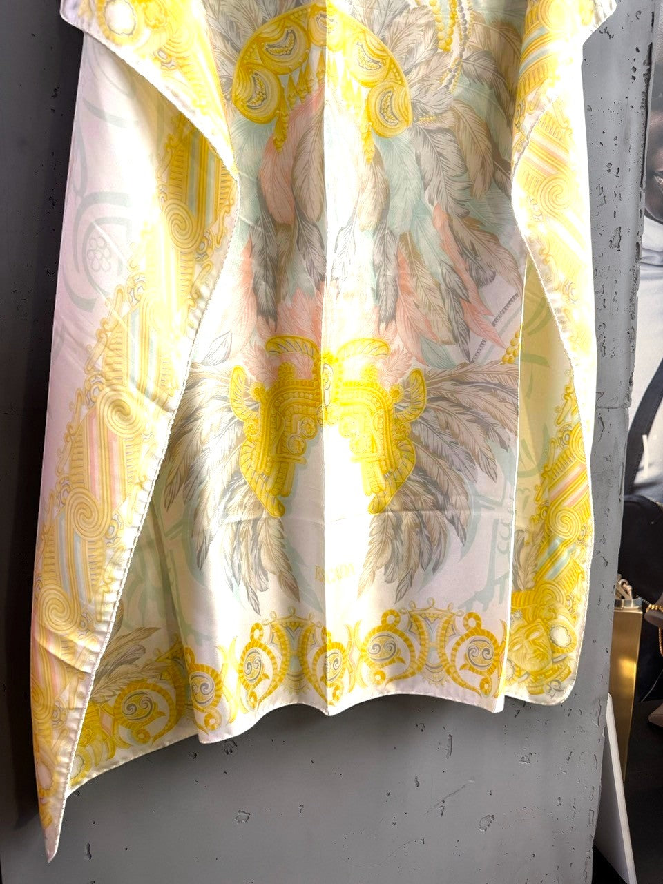 BERLIN VINTAGE CORNER Escada silk scarf with baroque motifs in yellow, peach, and sage green on a cream background.