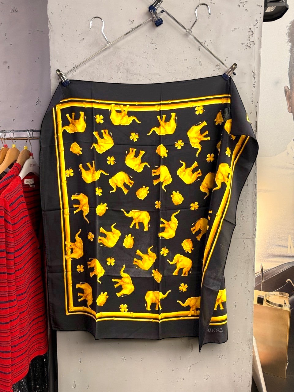 BERLIN VINTAGE CORNER ESCADA vintage silk scarf in black with golden-yellow elephant, turtle, and clover print.