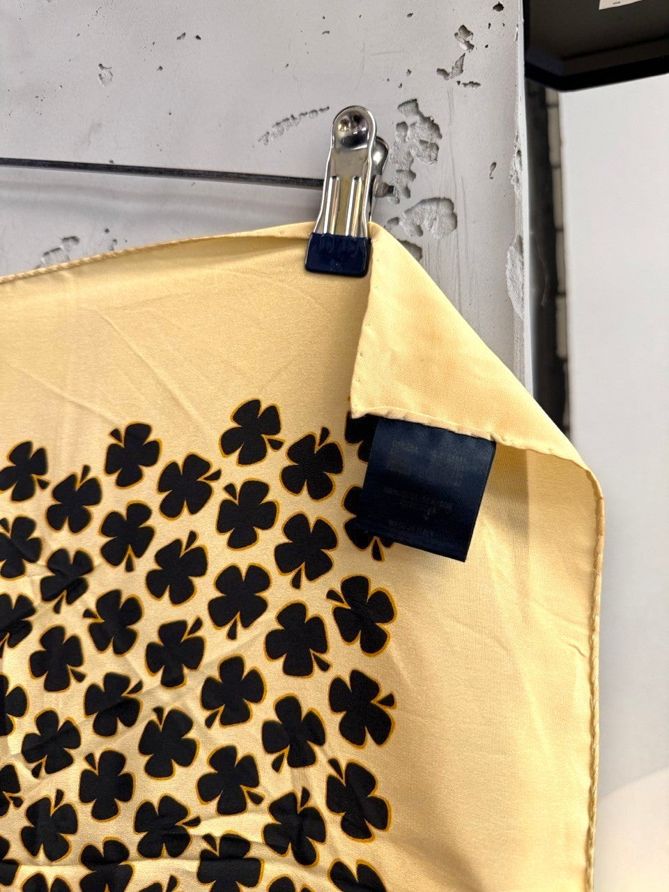 BERLIN VINTAGE CORNER Escada cream silk square scarf with a repeating black clover print and designer label tag.