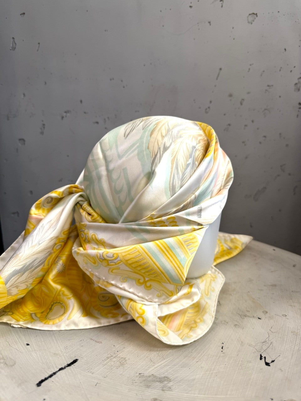 BERLIN VINTAGE CORNER vintage Escada silk scarf in yellow, peach, and sage green with ornate baroque patterns.