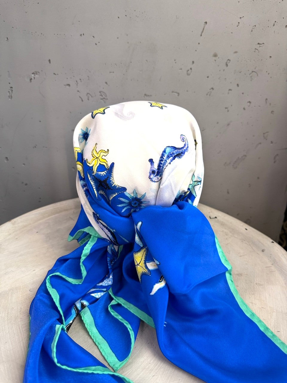 BERLIN VINTAGE CORNER Escada vintage silk scarf with nautical seahorse and starfish print in blue, white, and mint.