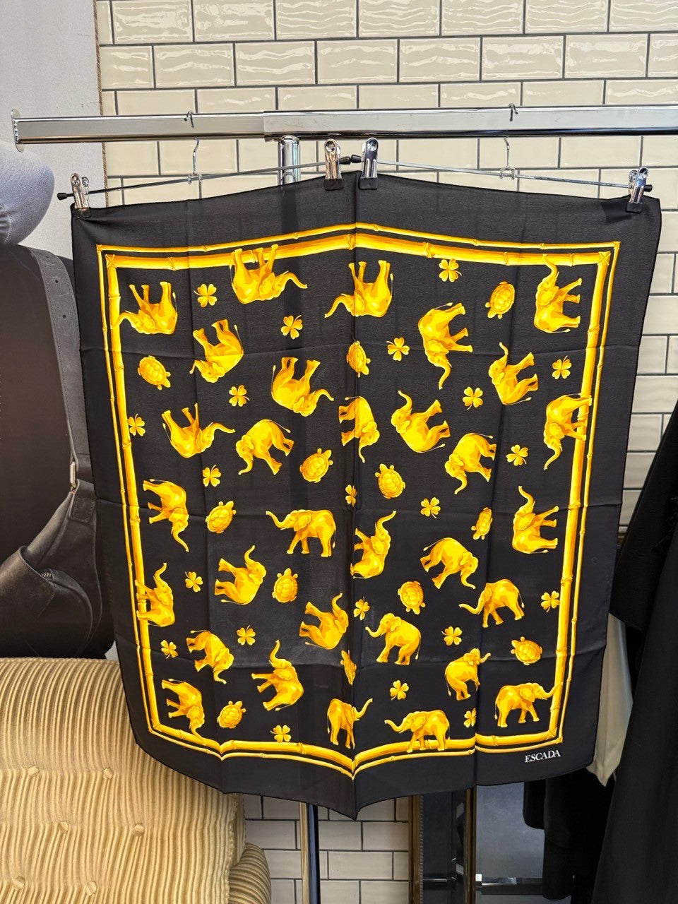 BERLIN VINTAGE CORNER Escada silk scarf in black with golden-yellow elephant, turtle, and clover bamboo border print.