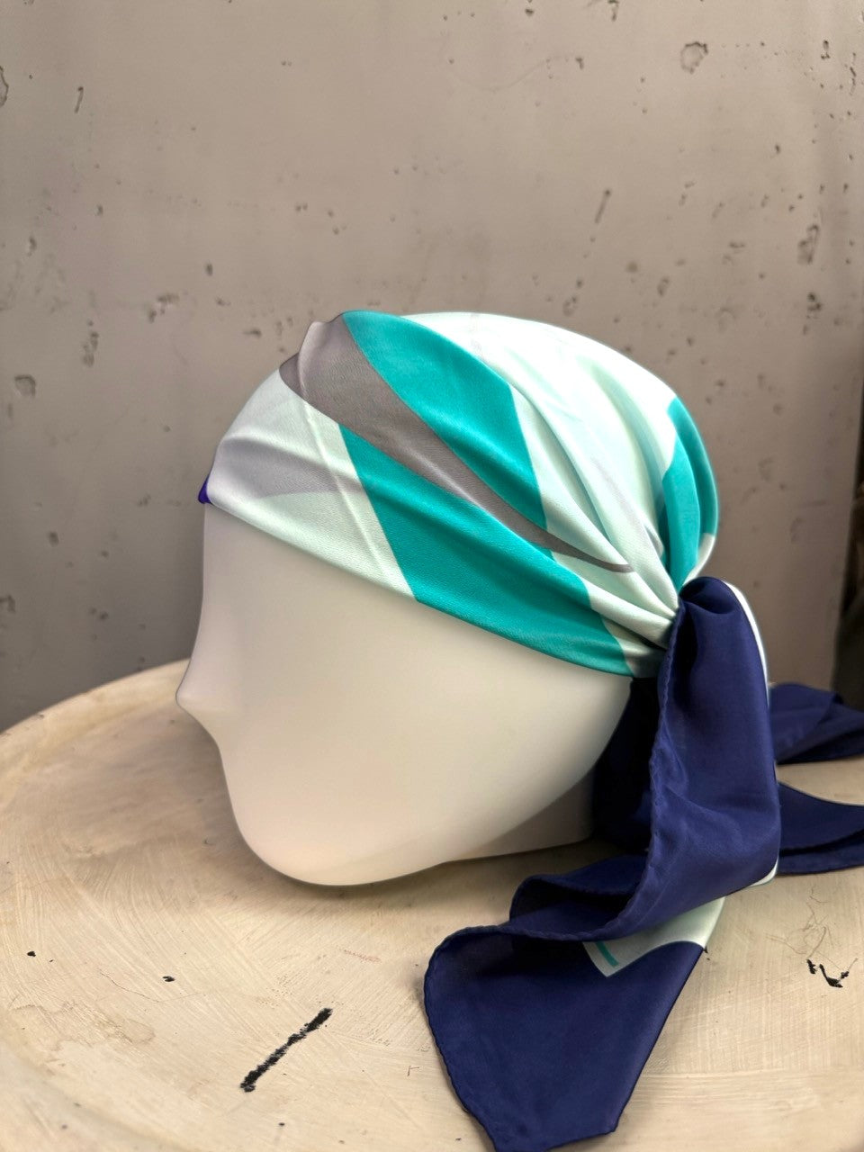 BERLIN VINTAGE CORNER Escada square silk scarf in mint, navy, and neutral graphic print styled as a headscarf