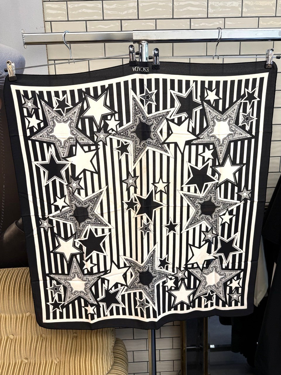 BERLIN VINTAGE CORNER Escada silk scarf featuring a black and white vertical stripe pattern with oversized star motifs.