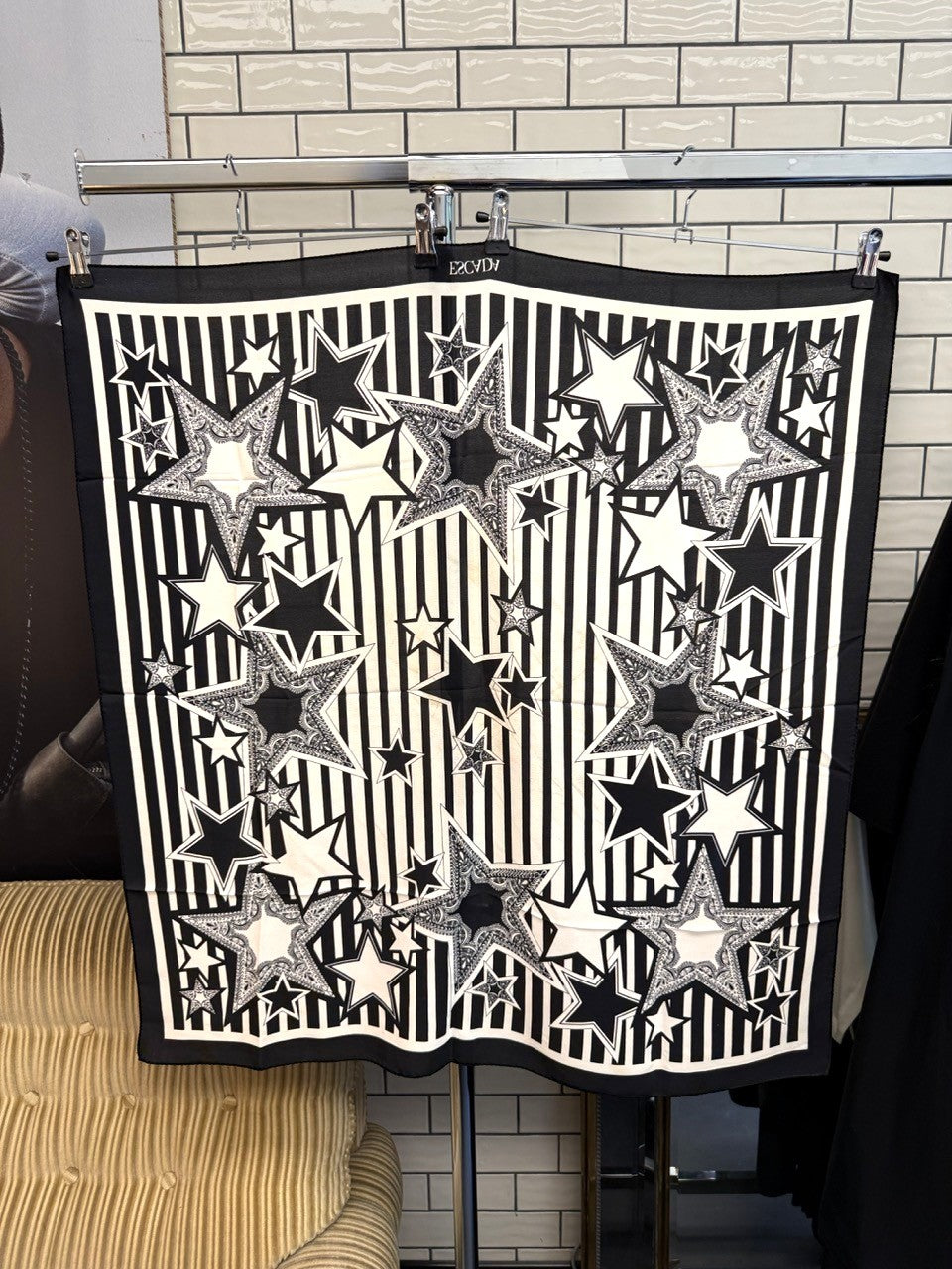BERLIN VINTAGE CORNER Escada silk scarf featuring a black and white vertical stripe pattern with oversized star motifs.