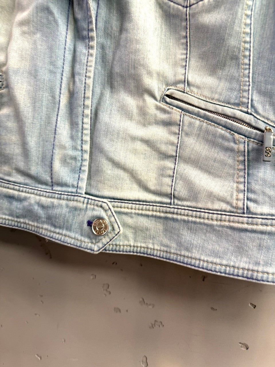 BERLIN VINTAGE CORNER Escada Sport light-wash denim jacket with zippered pockets and branded metal hardware.