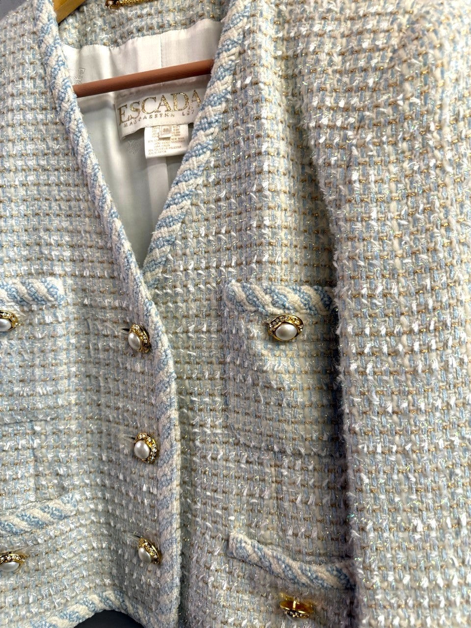 BERLIN VINTAGE CORNER Escada Margaretha Ley tweed blazer in light blue and white with gold pearl buttons and braided trim.