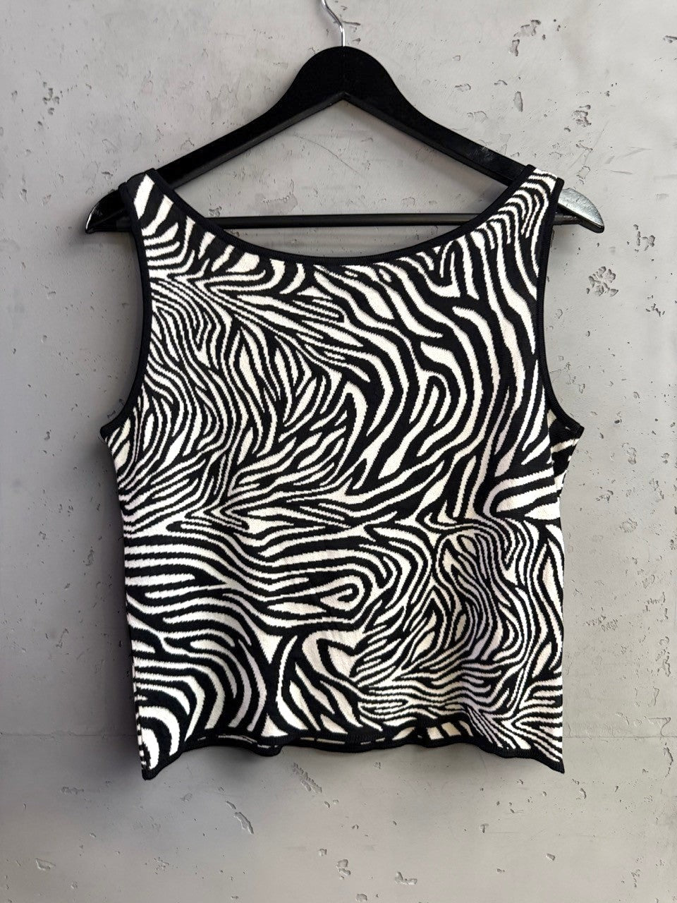 BERLIN VINTAGE CORNER Escada Margaretha Ley sleeveless knit top in black and white zebra print with a round neckline.
