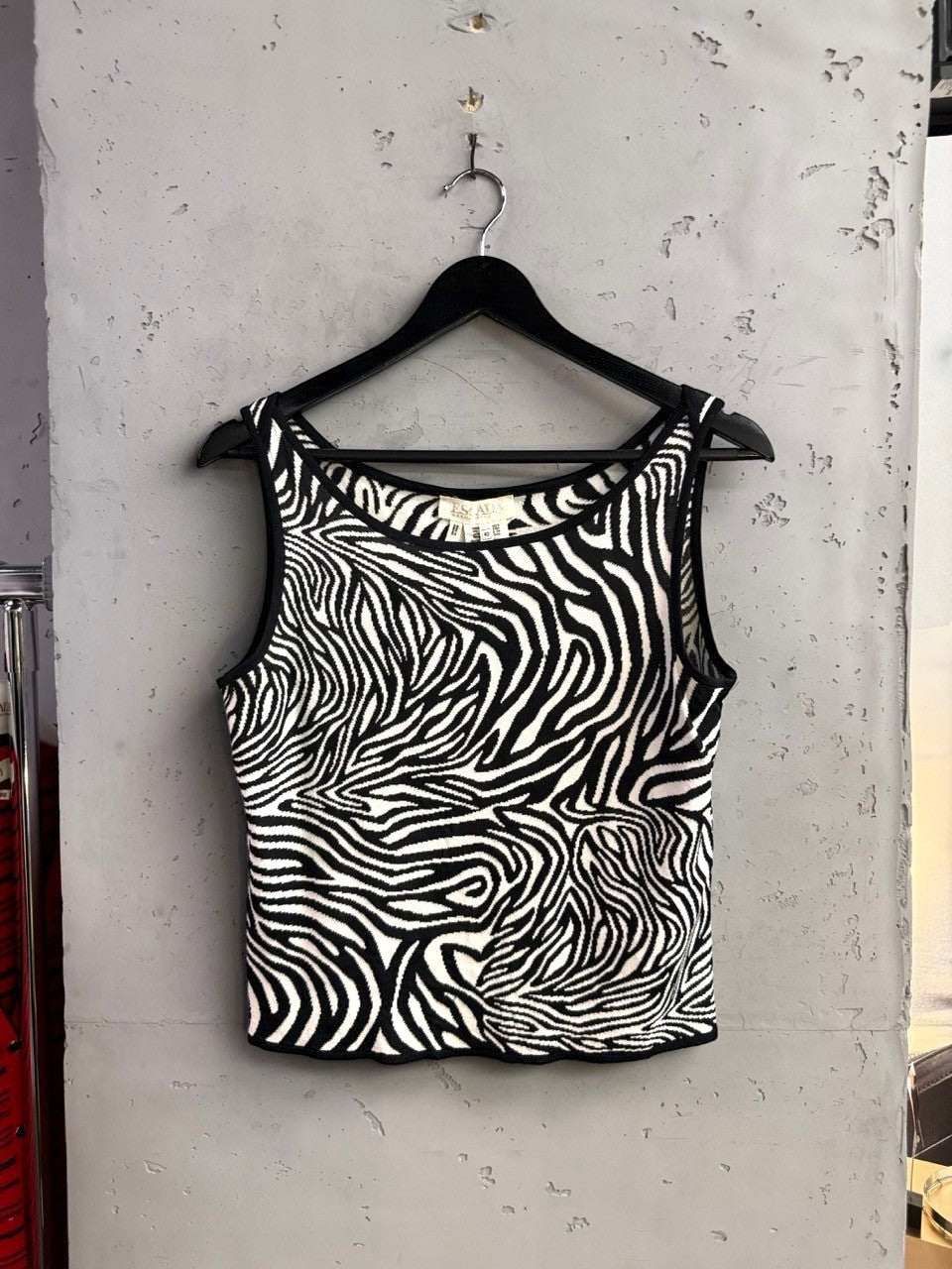 BERLIN VINTAGE CORNER Escada Margaretha Ley sleeveless knit tank top in a black and white zebra animal print.