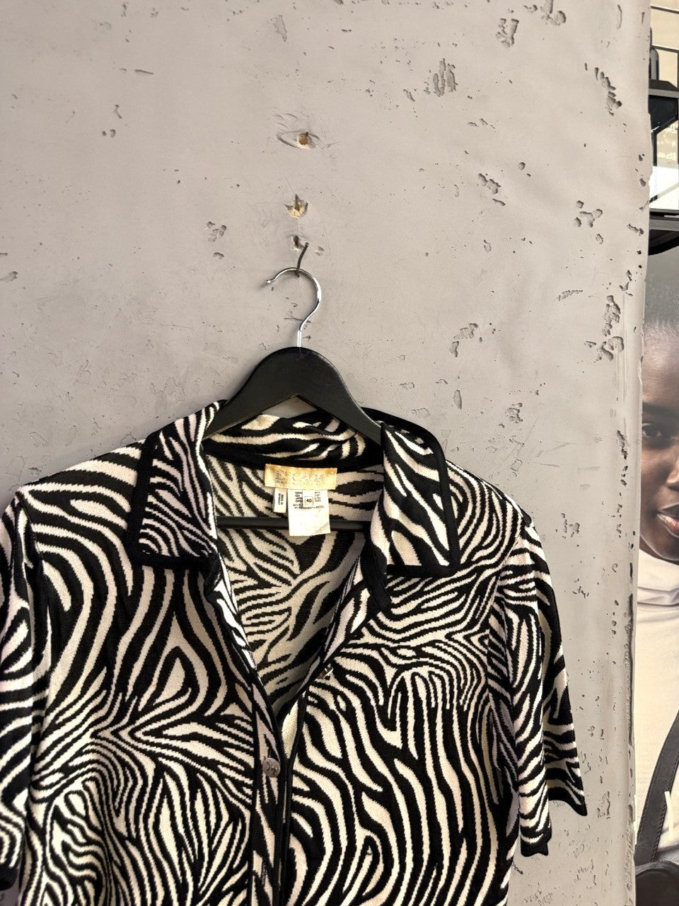 BERLIN VINTAGE CORNER Escada vintage black and white zebra print knit short-sleeve button-up shirt with collar.