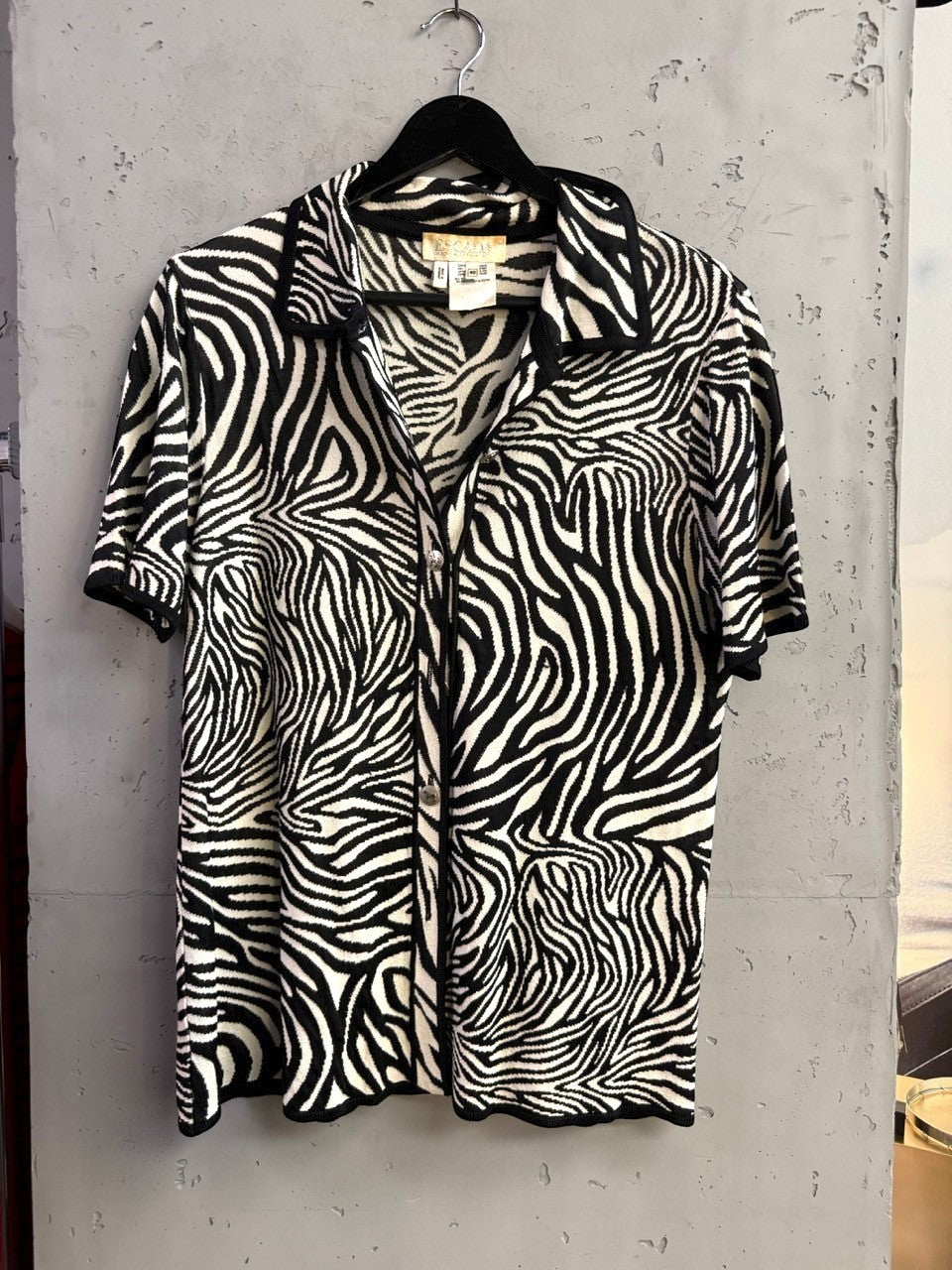 BERLIN VINTAGE CORNER Escada vintage short-sleeve knit shirt featuring a black and white zebra print pattern.