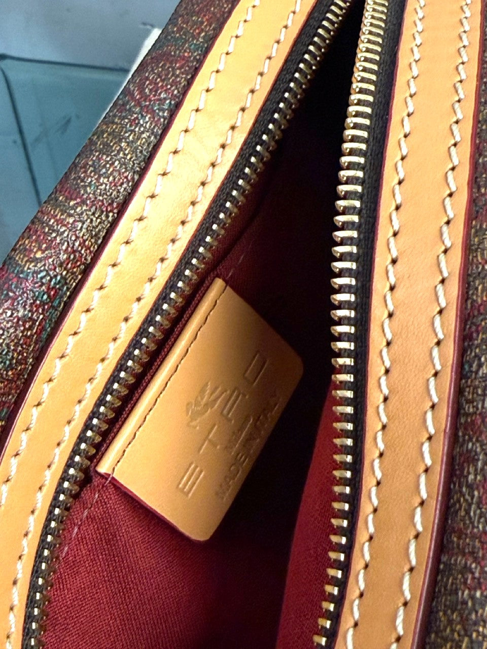 Etro camera bag, burgundy lining and leather tag