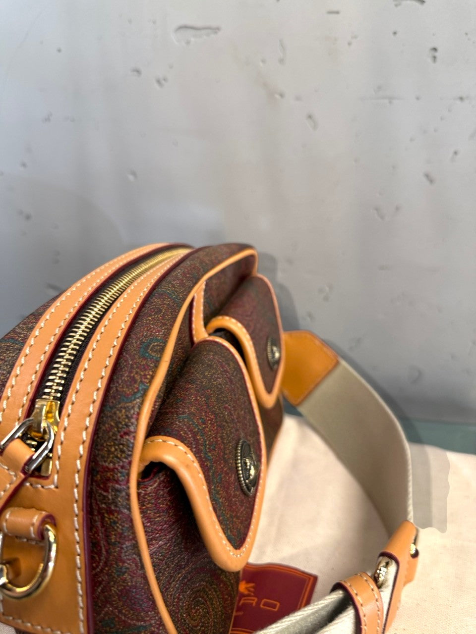 Etro camera bag, front pocket with Pegaso stud