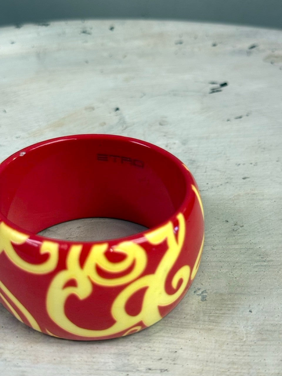 BERLIN VINTAGE CORNER ETRO red resin bangle bracelet with yellow swirling pattern and interior logo stamp