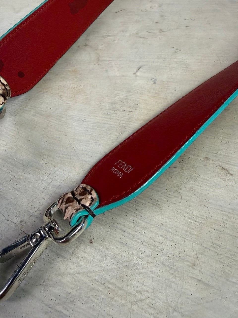 BERLIN VINTAGE CORNER Fendi Roma interchangeable handbag strap with snakeskin texture, red leather, and turquoise trim.