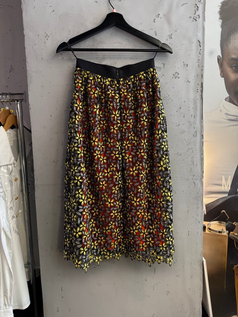 BERLIN VINTAGE CORNER Self-Portrait floral lace midi skirt with orange lining, yellow embroidered flowers, grey leaves, and elasticated waistband.