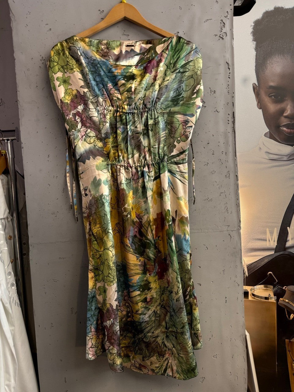 BERLIN VINTAGE CORNER floral print midi dress with cowl neck, elasticated waist, and tie shoulder details. Green, blue, purple, yellow.
